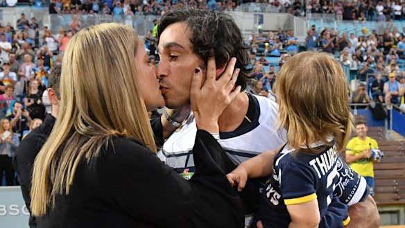 Sealed with a kiss: Johnathan Thurston with wife Samantha before his final match.