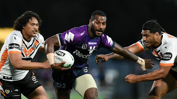 Suliasi Vunivalu rips through the Tigers’ defence in 2020 for the Melbourne Storm. 