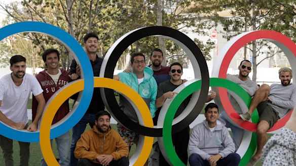 Tourists have their photo taken with the Olympic rings in Tokyo at the weekend. 