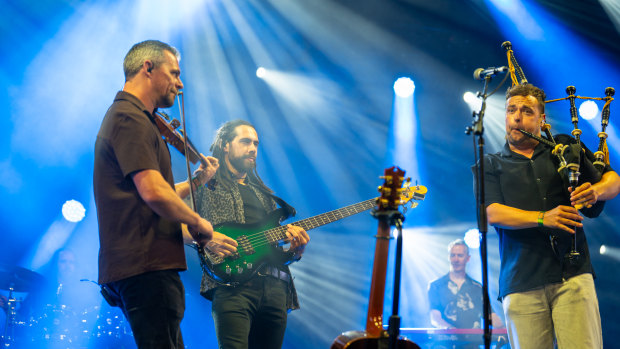Scott Wood (right) playing his century-old bagpipes with his fellow band members Craig Espie (fiddle) and Jodie Bremaneson (bass).