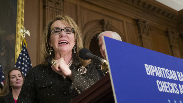 Former representative Gabby Giffords speaks during a news conference to announce the introduction of bipartisan legislation to expand background checks for sales and transfers of firearms.