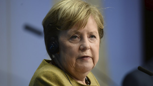 German Chancellor Angela Merkel speaks during a media conference at an EU summit in Brussels. 