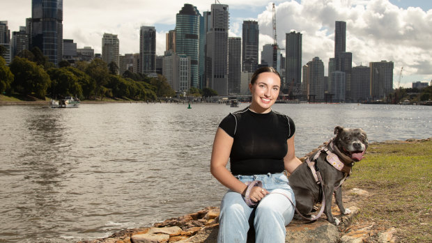 Sophie Mather with Delilah, one of many staffies who call Brisbane home.
