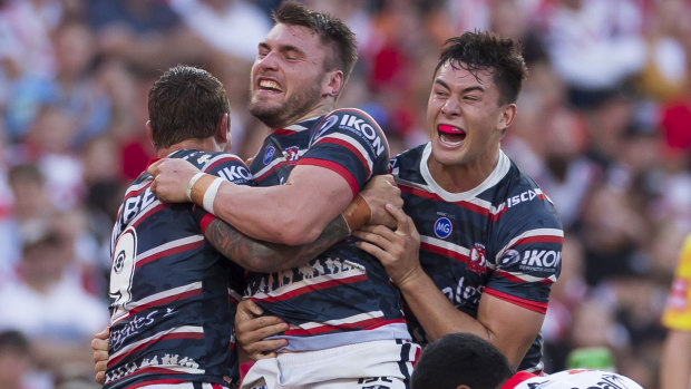 Prime beef: Angus Crichton and his teammates celebrate the Roosters forward's try at the SCG on Thursday.