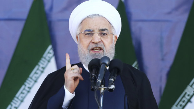 Iran's President Hassan Rouhani speaks at a military parade marking the 38th anniversary of Iraq's 1980 invasion of Iran on Saturday.