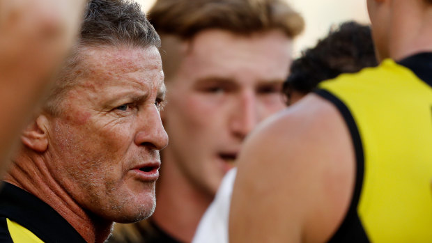 Damien Hardwick says players, coaches and umpires all have a role to play in reducing the number of dangerous tackles.