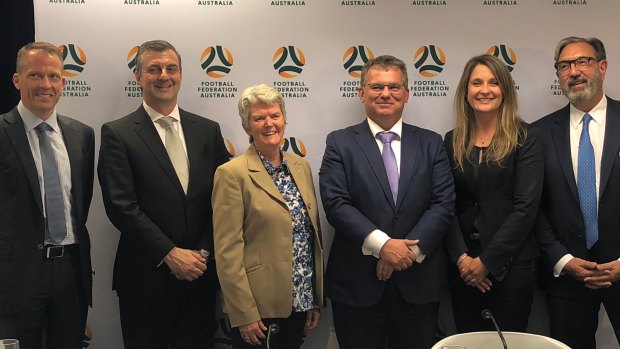 Sitting out: FFA board members Joseph Carrozzi (second left) and Remo Nogarotto (far right) may recuse themselves from a vote on A-League expansion.