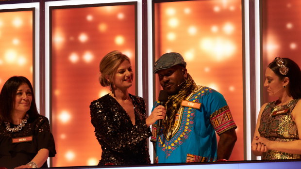 Rapper Kayo Marbilus gives feedback to host Julia Zemiro on 'All Together Now'.