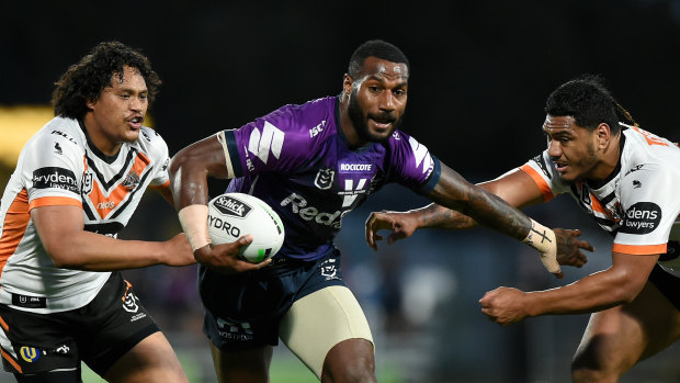 Suliasi Vunivalu rips through the Tigers’ defence in 2020 for the Melbourne Storm. 