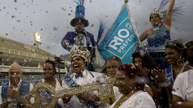 Carnival King Momo Wilson Neto holds the key to the city at a ceremony marking the official start of Carnival at the Sambadrome in Rio de Janeiro.