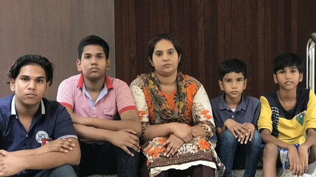 Pakistani Christian refugee Soniazahid Younis with her four sons, Shahzaib, 16, Shahwaiz, 14, Sharaiz, 10 and Zohaib, 8, at Xavier Hall in Bangkok. The family fled persecution in Pakistan and live in a legal limbo. 