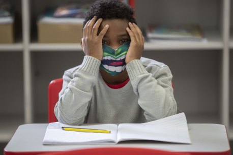 A student wears a mask on the first day back to in-person classes amid the COVID-19 pandemic in Sao Paulo, Brazil. Sao Paulo state government has allowed the schools to resume classes with up to 35 per cent of its students. 