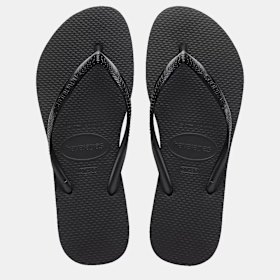 Grant wears rubber thongs to keep his feet cool in the European summer.