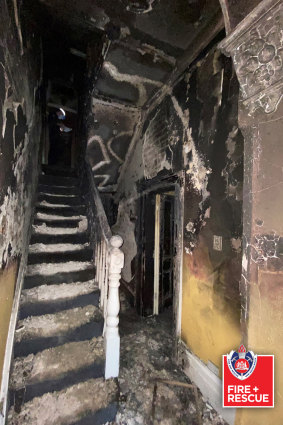 The stairwell of the terrace house badly damaged by fire. 