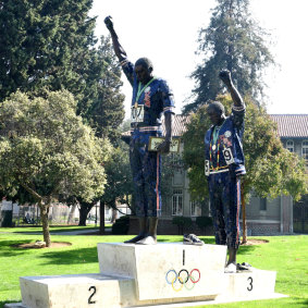 The statue of Tommie Smith and John Carlos in San Jose with the Peter Norman spot vacant.