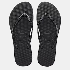 Grant wears rubber thongs to keep his feet cool in the European summer.
