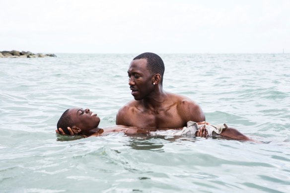 Alex Hibbert and Mahershala Ali in the scene from Moonlight that was reimagined through Britell’s score.