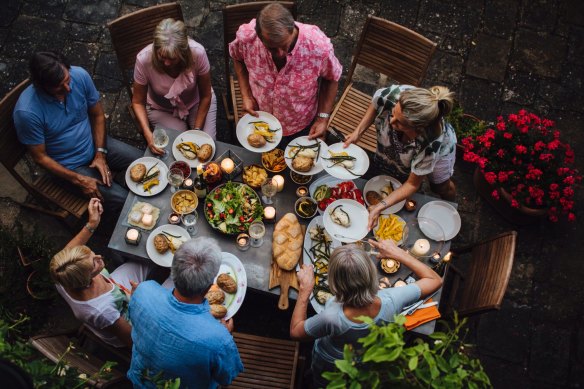 Worried about the cost of a dinner party? Consider making it a potluck event.