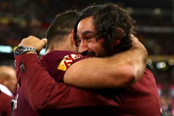 Look familiar? Cameron Smith and sidelined Maroons legend Johnathan Thurston embrace after Origin III in 2017.