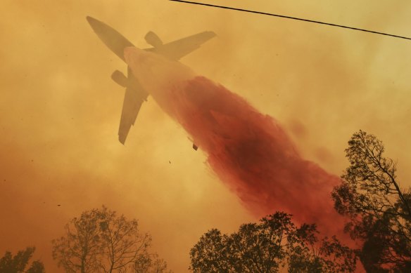 Fire retardant is dropped during the Green Wattle fire last year. There are concerns about the direct affect on water catchments.