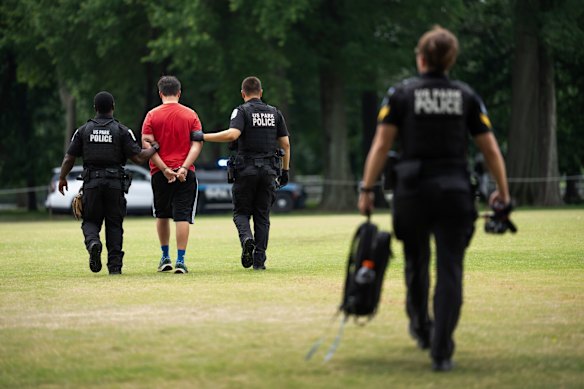 A pedestrian was detained for alleged disorderly conduct next to the Lincoln Memorial Reflecting Pool on Monday.
