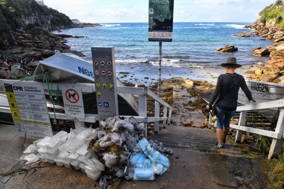Council workers and SES have been collecting debris including surgical masks which have washed up near Gordons Bay.