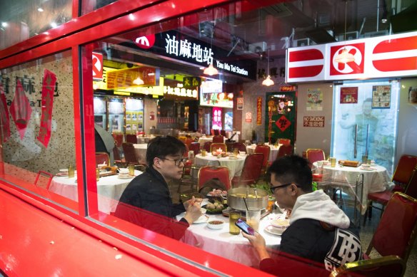 Cafes and restaurants are reopening with a limit of 10 people. Diners inside a restaurant in Chinatown. 15th May 2020. Photo: Edwina Pickles / SMH
Coronavirus