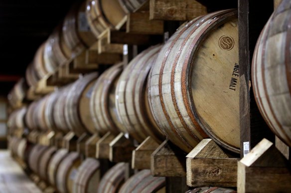 Bourbon barrels in an ageing warehouse at the James B. Beam distillery in Clermont, Kentucky.