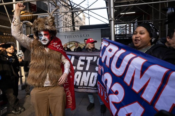 Demonstrators protest in support of former US president Donald Trump outside Trump Tower in New York. 