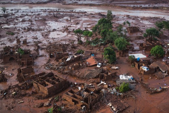 Homes lay in ruins in Bento Rodrigues, Minas Gerais, Brazil, after the Samarco dam burst on November 5, 2015. 