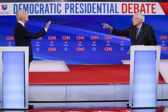 Joe Biden and Bernie Sanders during a Democratic presidential primary debate in 2020.