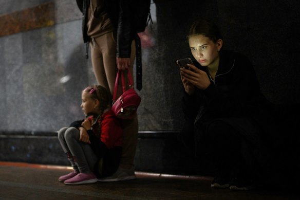 A woman and child shelter in Lviv during the early months of the war in 2022. 