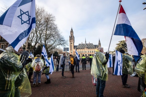 Pro-Israel demonstrators march towards the ICJ in The Hague, Netherlands.