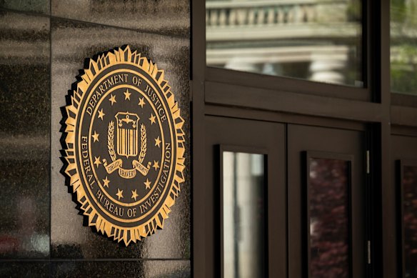 The Department of Justice (DOJ) seal on the J. Edgar Hoover Federal Bureau of Investigation (FBI) building in Washington.