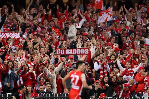 Swans fans celebrate as Justin McInerney kicks a goal at the SCG and leaves the Pies cold.