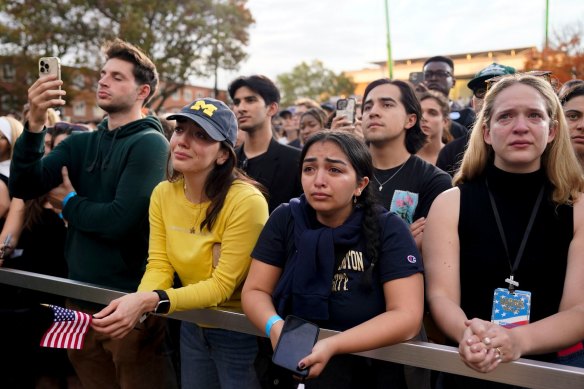 Emotional supporters react as US Vice President Kamala Harris speaks following her election defeat.