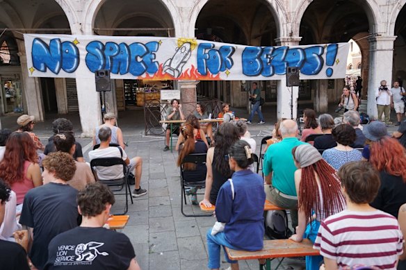 Activists from “No Space For Bezos” and Venetian residents at a public meeting in Venice.