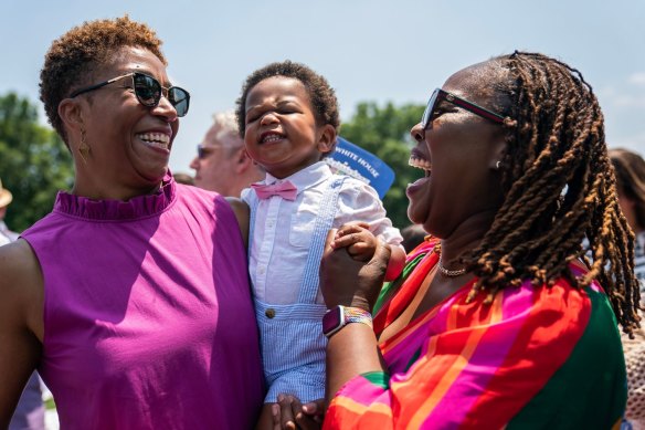 Attendees listen as US President Joe Biden speaks during a Pride Month celebration event at the White House.