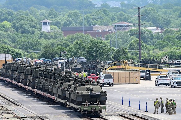 Tanks to be used in the US Army’s 250th anniversary parade prior to being unloaded from rail cars in Washington.