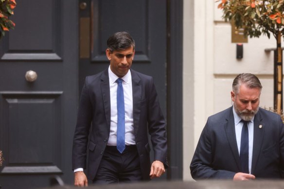 Rishi Sunak departs the Conservative Party’s headquarters in London.
       