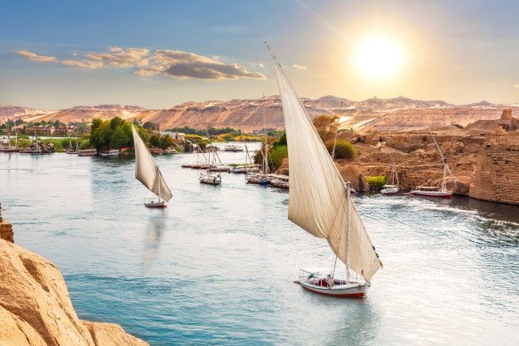 On the Nile sailboats near the banks of Aswan, Egypt.