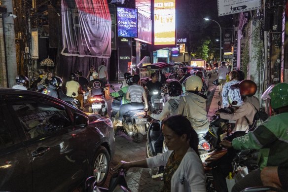 Traffic near nightclubs in Kuta, Bali.