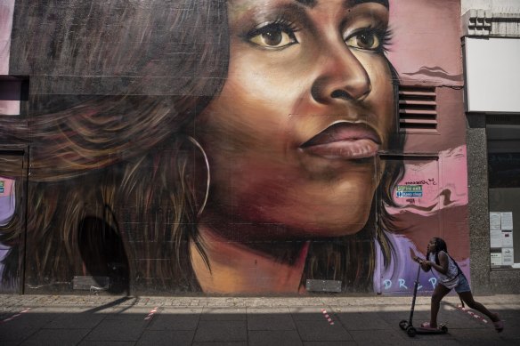 Michelle Obama, celebrated above in a mural in Brixton, discussed her depression this week