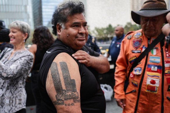 An attendee with a tattoo of the Twin Towers at the memorial in New York on Friday.