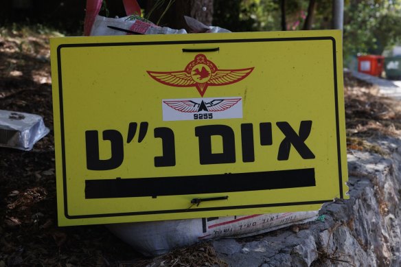 A sign warns of the threat from Hezbollah missiles near the Lebanon border in Kibbutz Hanita.