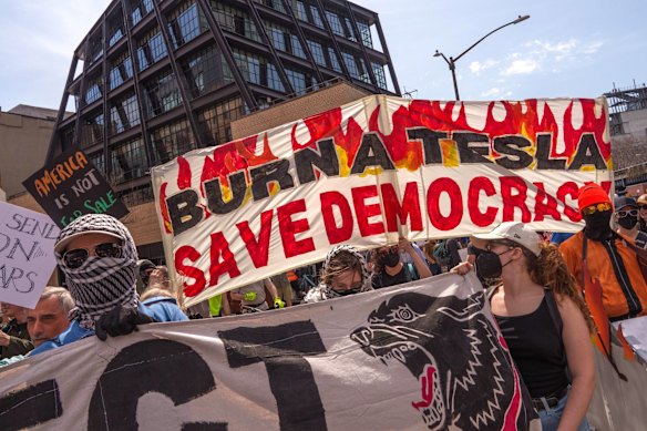Protesters at a Tesla Takedown rally in New York in March.