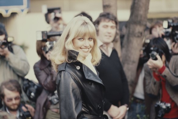 Olivia Newton-John pictured in 1978 at a press conference to promote Grease.