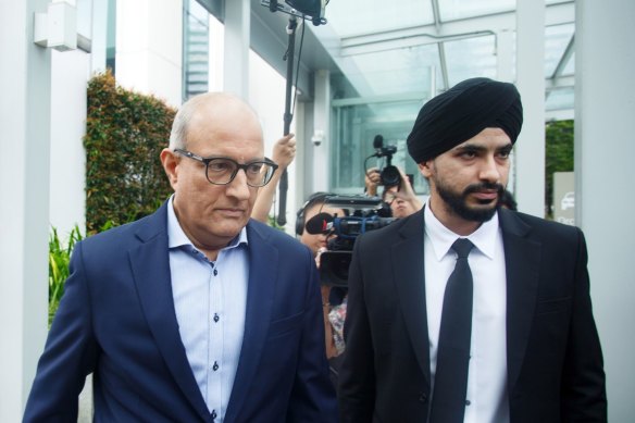 S. Iswaran (left) leaves court on Thursday, charged with corruption over his time as Singapore’s transport and trade minister.