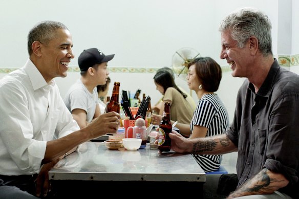 Bourdain and Barack Obama sit down for a meal in Hanoi in 2016.