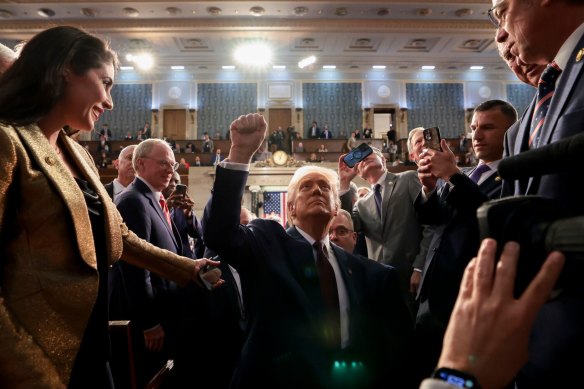 US President Donald Trump departs following a joint session of Congress.